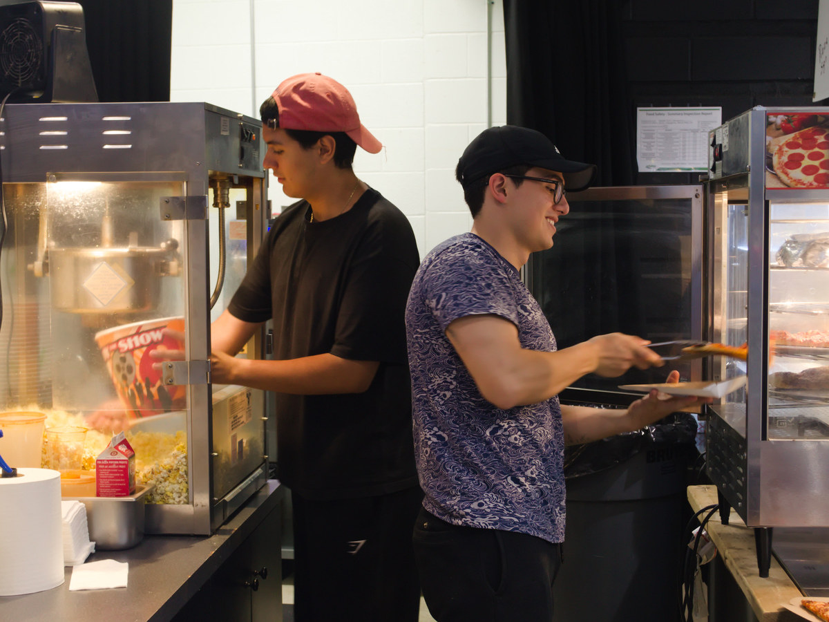 Staff working the On the Fly Café counter