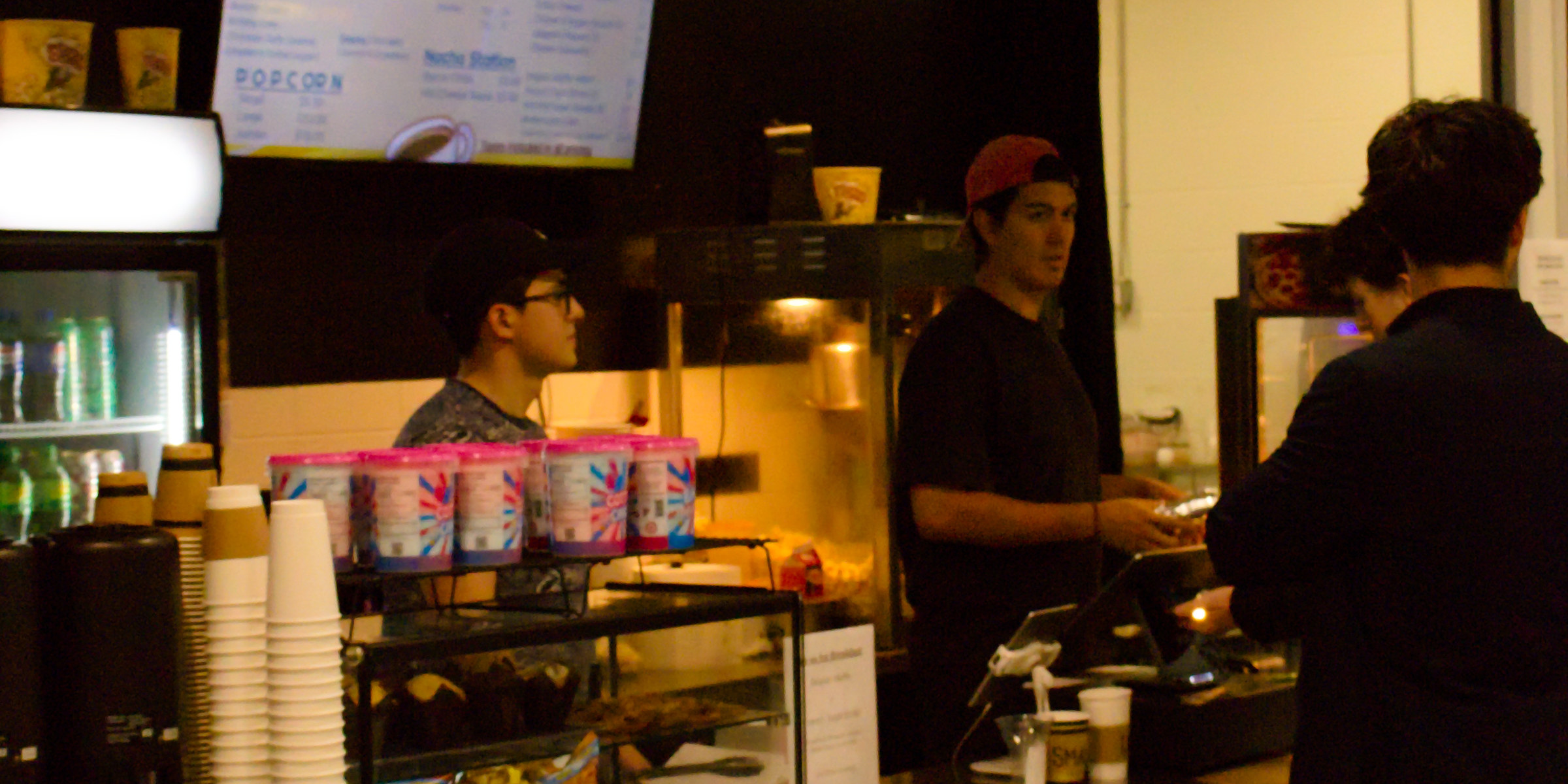 The On the Fly Café counter with staff serving guests